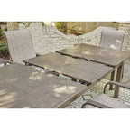 Signature Design by Ashley Beach Front Beige 7-Piece Outdoor Dining Package - 42 W x 94 D x 29.63 H